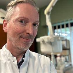 Dr. Coel Mark