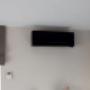 Airconditioning zwart woonkamer
