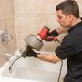 douche ontstoppen
