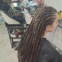 nattes couchee Coiffure Eden Rehoboth